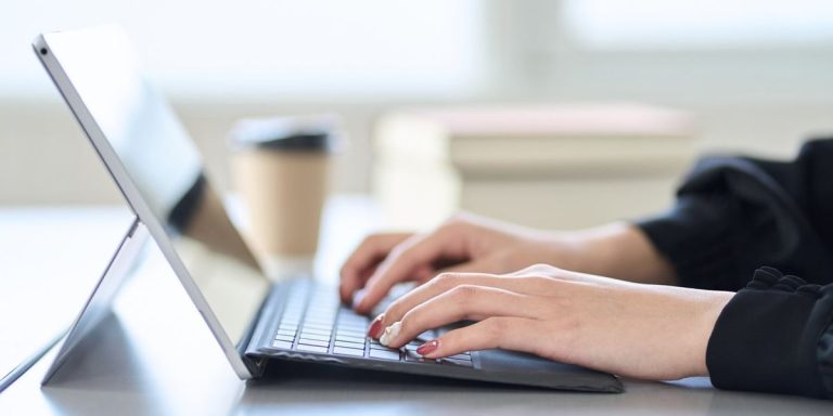 Woman Typing On Laptop.jpg