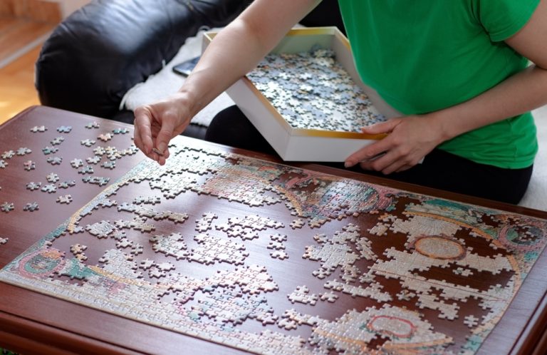 Jigsaw Puzzle On Table.jpg