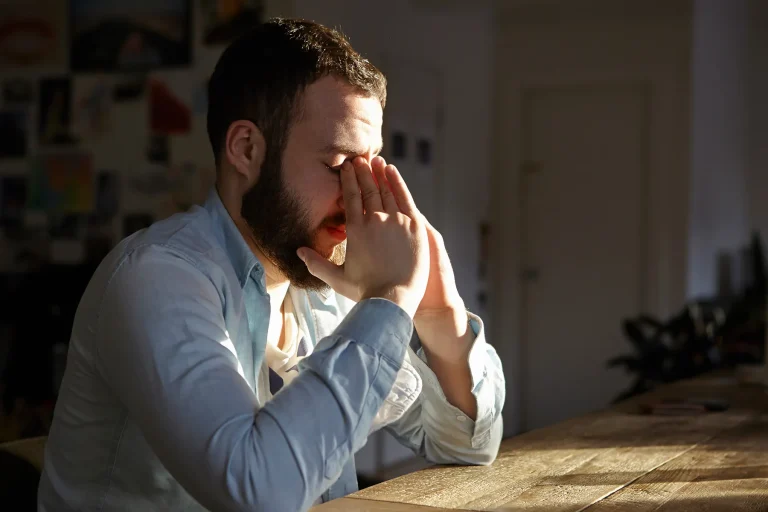 1800ss Getty Rf Anxious Man At Kitchen Table.jpg