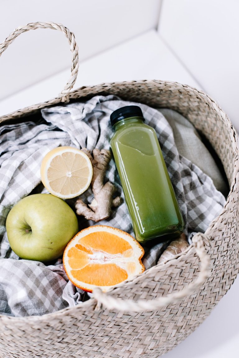 Green Disposable Lighter Beside Orange Fruit On Brown Woven Basket Scaled.jpg