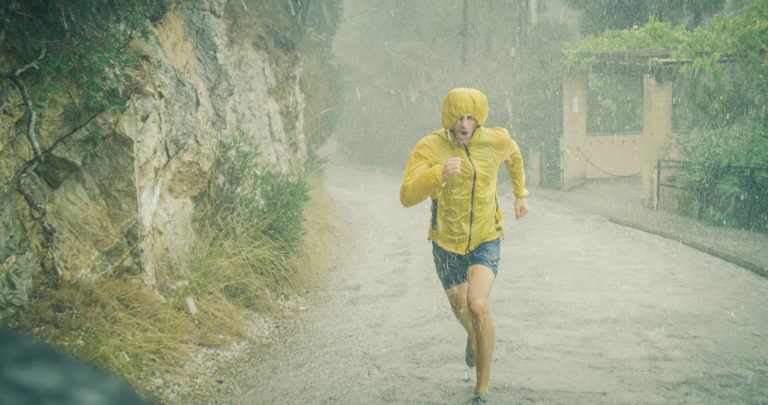 Man Running In The Rain.jpg