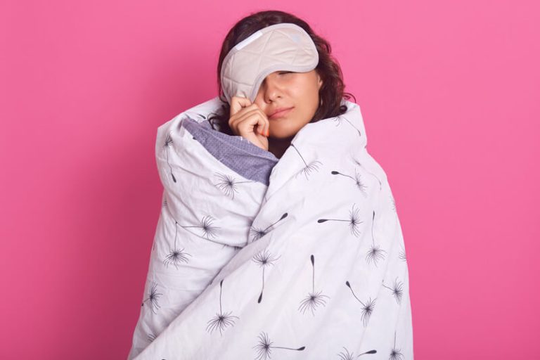 Woman Peeping From Sleeping Mask Does Want Wake Up Keeps Eyes Closed Wearing White Blanket.jpg