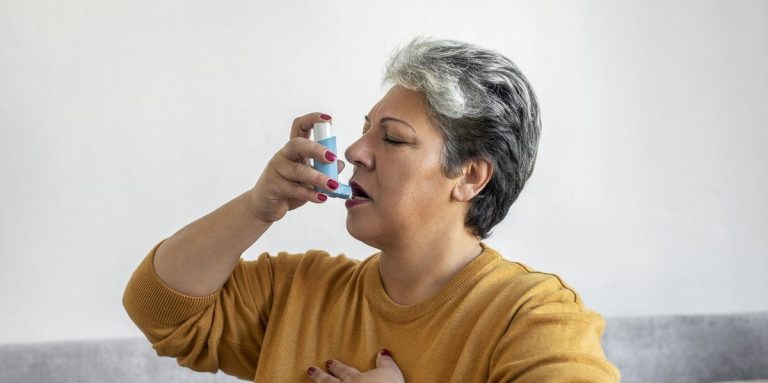 Woman Using Asthma Inhale.jpg