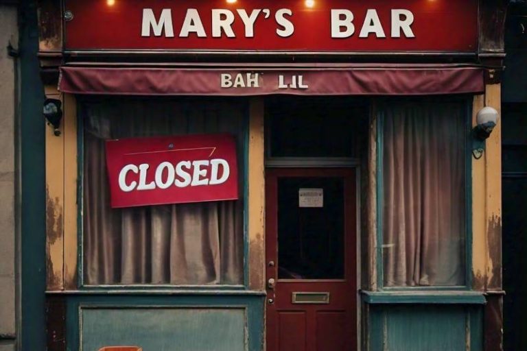 A Bar With A Closed Sign In The Window.jpg