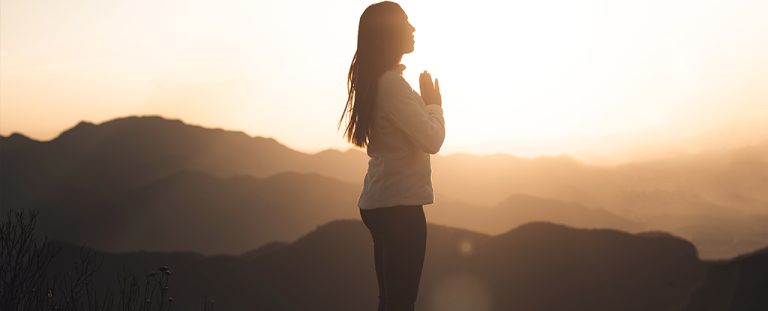 Person Praying Sunset.jpg