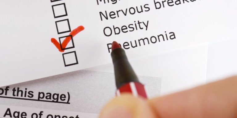 Obesity Checked From A List Of Items With A Red Pen.jpg