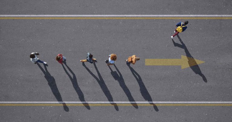 People Walking In Line On Road Mobi Getty Klaus Vedfelt Compressed.jpg