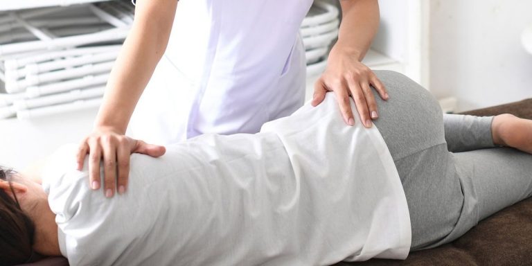 Medical Worker And A Female Patient Performing Pelvic Correction Surgery.jpg