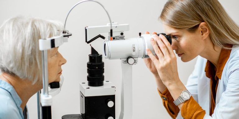 Ophthalmologist Examining Eyes With A Microscope.jpg