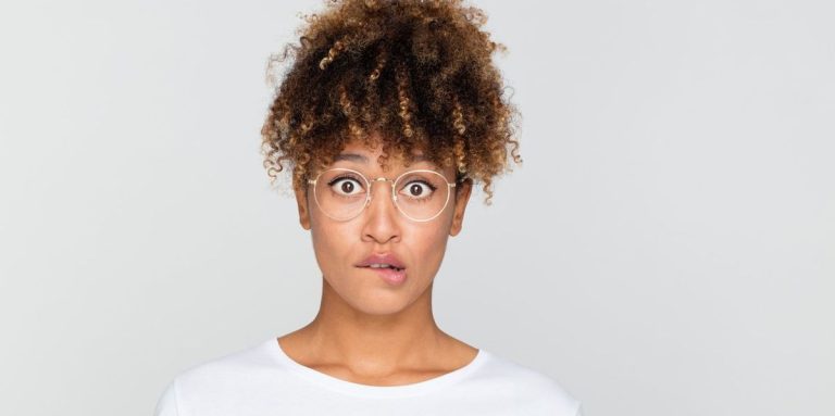 Young Afro American Woman Looking Nervous Biting Her Lips.jpg