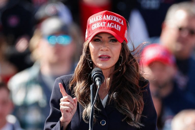 Governor Kristi Noem W Maga Hat Speaks.jpg